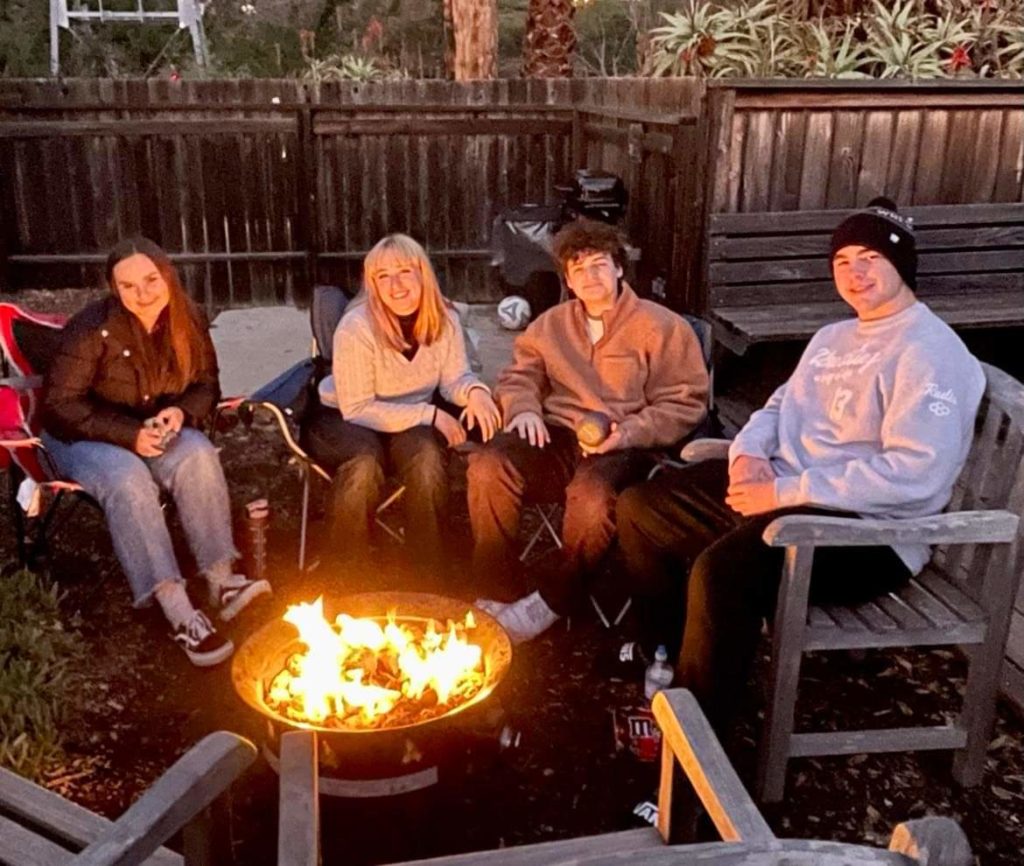 teenager beach smores party